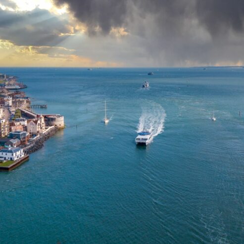 View from Spinnaker Tower Portsmouth on a cloudy day with the Sea Cat approaching through Portsmouth Harbour